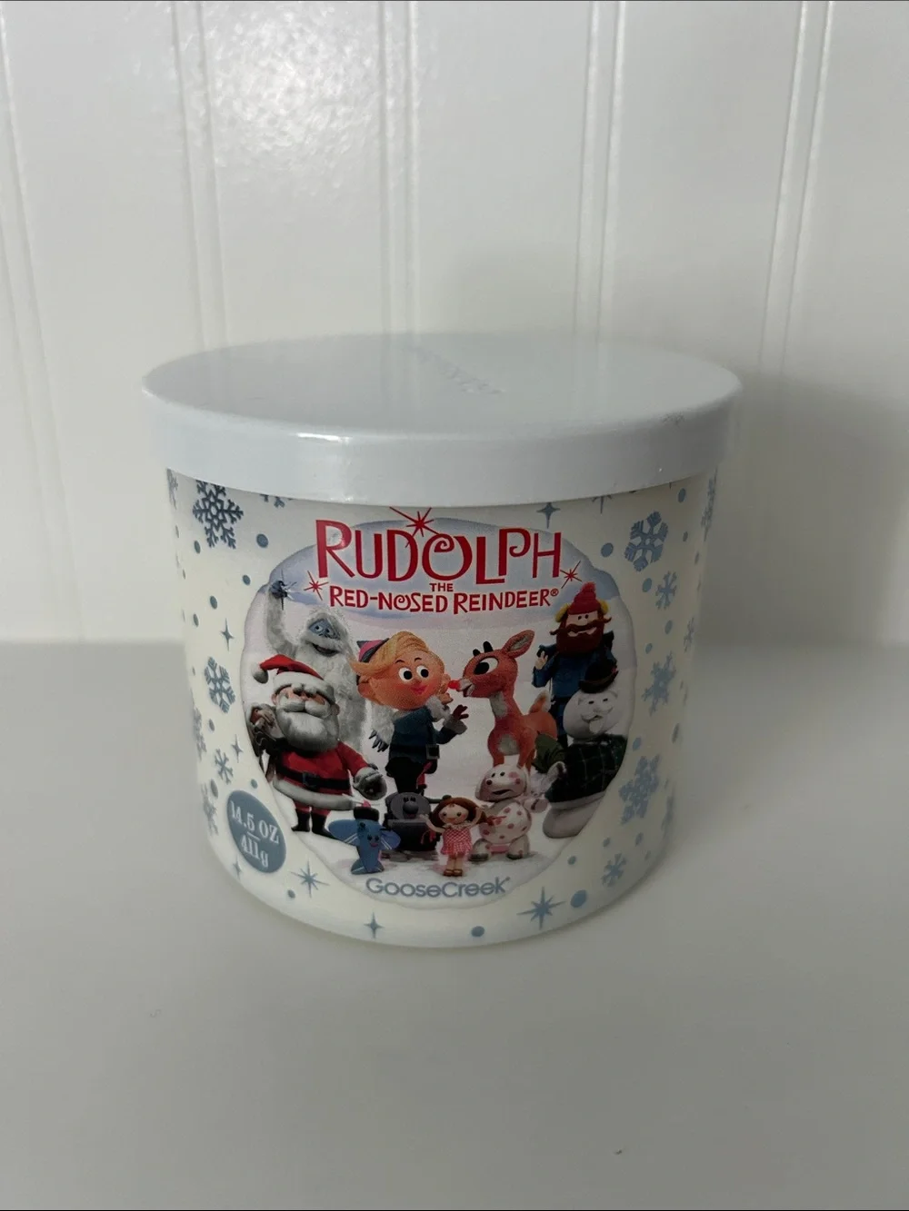 Goose Creek Rudolph the Red-Nosed Reindeer Holiday Candle - White